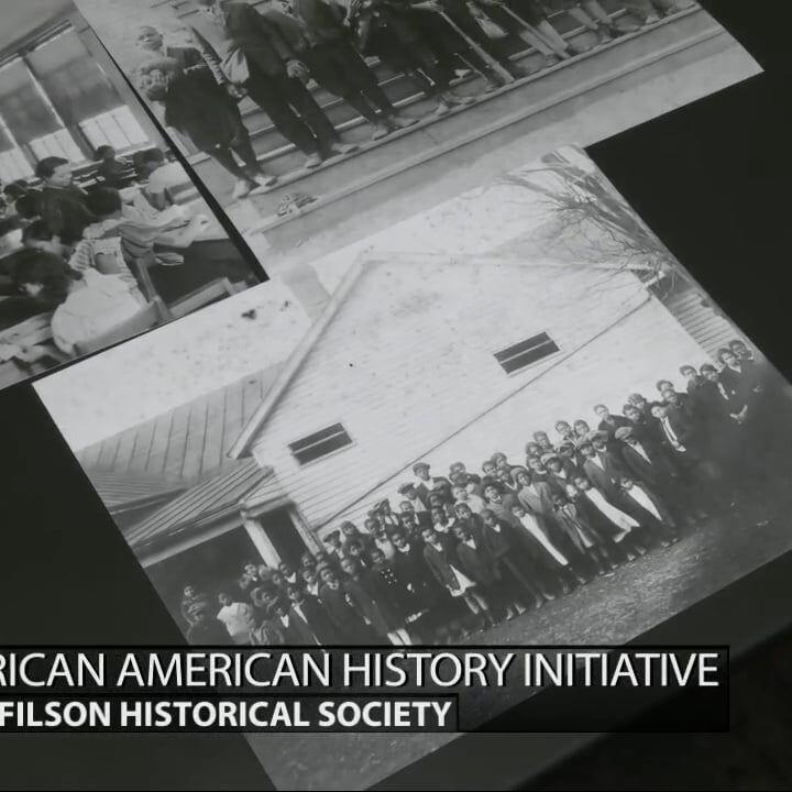 Keith Kaiser flips through photographs at the Filson Historical Society
